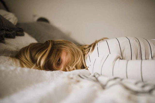 A woman lying face down